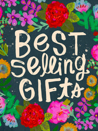 A colorful graphic with the words 'Best Selling GIFTS' in large cream-colored brush-style lettering on a dark teal background, surrounded by illustrated flowers in pink, red, purple, yellow, and green.
